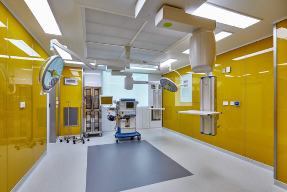 Novaptus Surgery Centre, where the stunning colours create a memorable experience for visiting surgeons. Modular glass panels allow the designer to be bold with colours of magenta, ultra-marine, emerald and gold. The colours of the operating theatres are the hallmark of the centre.