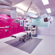 Novaptus Surgery Centre, where the stunning colours create a memorable experience for visiting surgeons. Modular glass panels allow the designer to be bold with colours of magenta, ultra-marine, emerald and gold. The colours of the operating theatres are the hallmark of the centre.