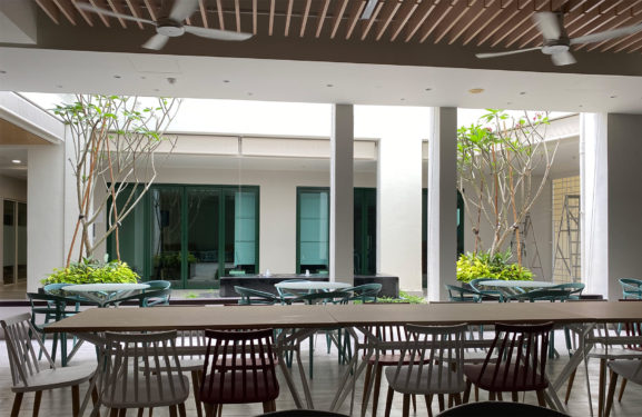 MWS Bethany Nursing Home. The design makes full use of the airwell to incorporate a water feature to bring the sound of nature to the wards above. This feature of the staff dining and community area acts as a memorable focal point for staff, residents and visitors alike.