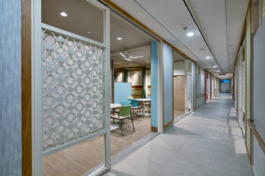 MWS Bethany Nursing Home. The clean corridor acts as a street with residences opening on to it. At times this is a hive of activity when used for rehabilitation. The screens can be fully closed for greater privacy at night and during bathing periods.