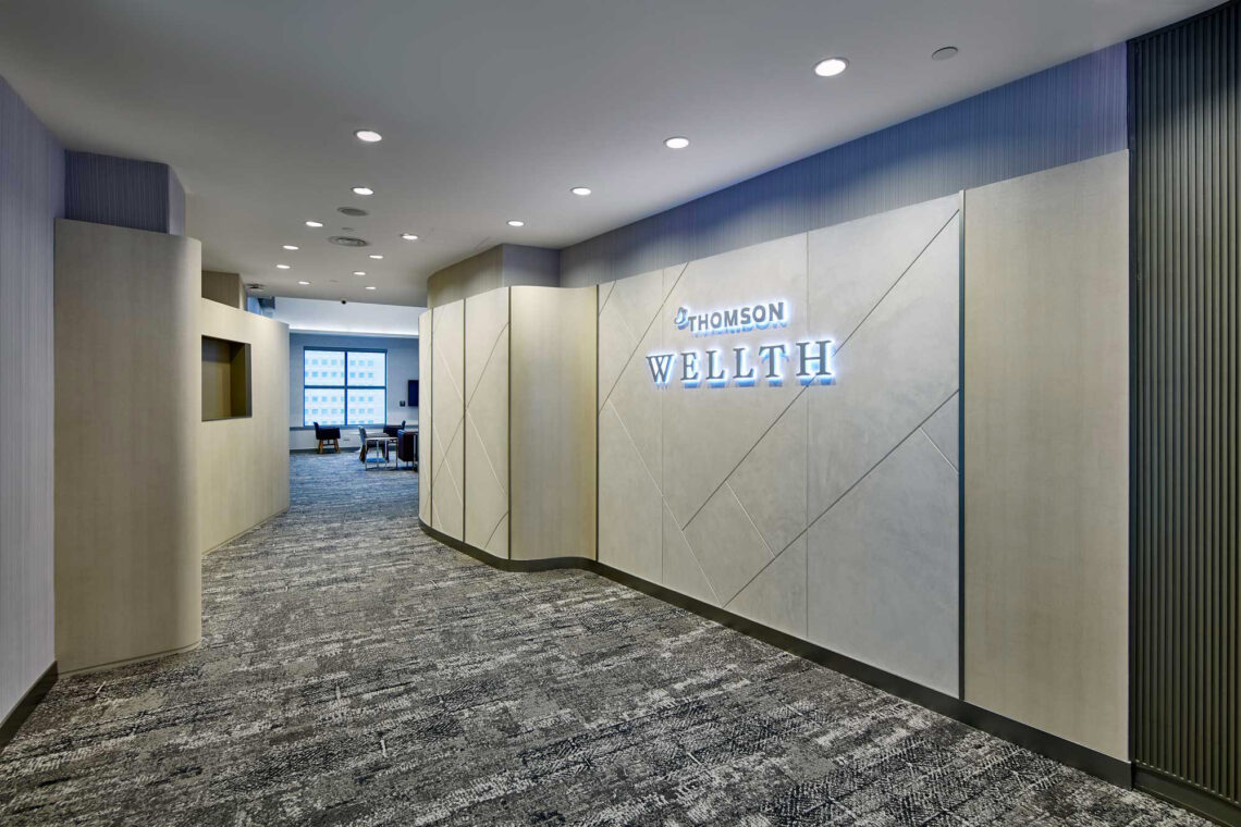 Thomson Medical Group Nodal Centre; Entrance to the Fertility Clinic, Women's Health Clinic, and Thomson Wellth Clinic. The design uses a warm colour palette, curves and clean lines to put visitors at ease. As the lead brand in the space, Thomson Wellth is the given the prominent location.