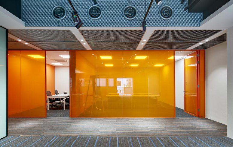 Acromec Ltd Offices. The industrial look commences in the client interaction area designed as a gallery space, where expanded mesh and hard floors set the tone. Reverberation of the space is controlled by incorporating closed cell foam behind the mesh.